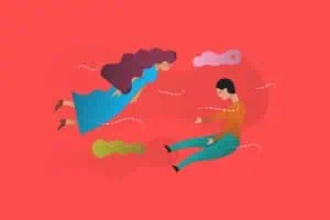 Seorang laki-laki dan perempuan melayang di udara